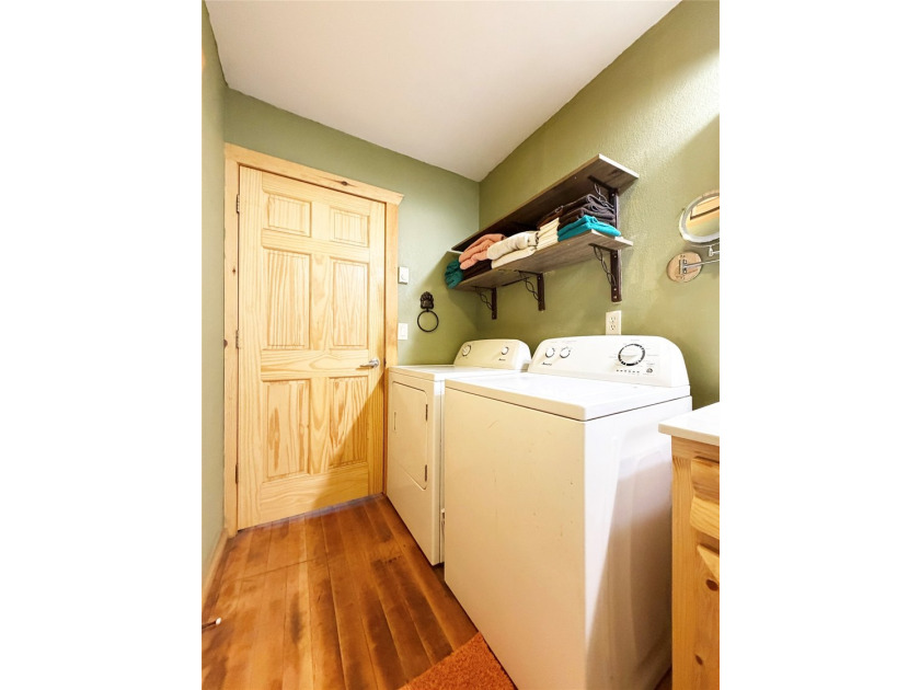 Enjoy peaceful riverfront living in this charming 1-bedroom - photo 17