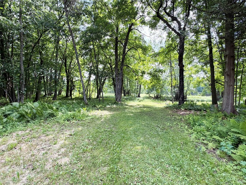 Enjoy peaceful riverfront living in this charming 1-bedroom - photo 19