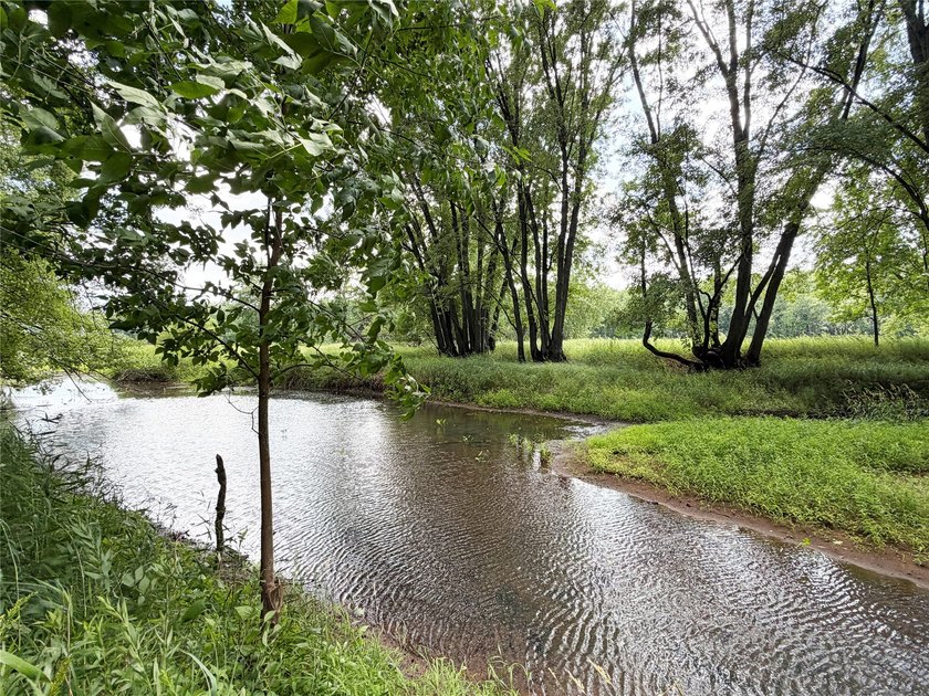 Enjoy peaceful riverfront living in this charming 1-bedroom - photo 20