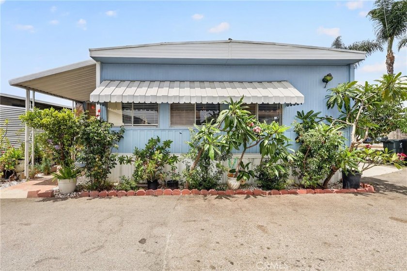 Welcome to this inviting 3-bedroom, 2-bath mobile home offering - photo 40