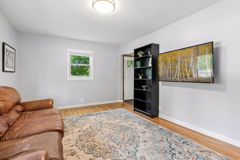 This walkout rambler is nestled on a quiet street with easy - photo 16