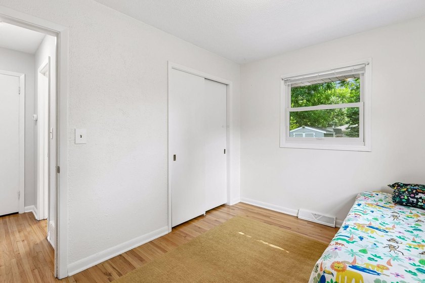 This walkout rambler is nestled on a quiet street with easy - photo 29