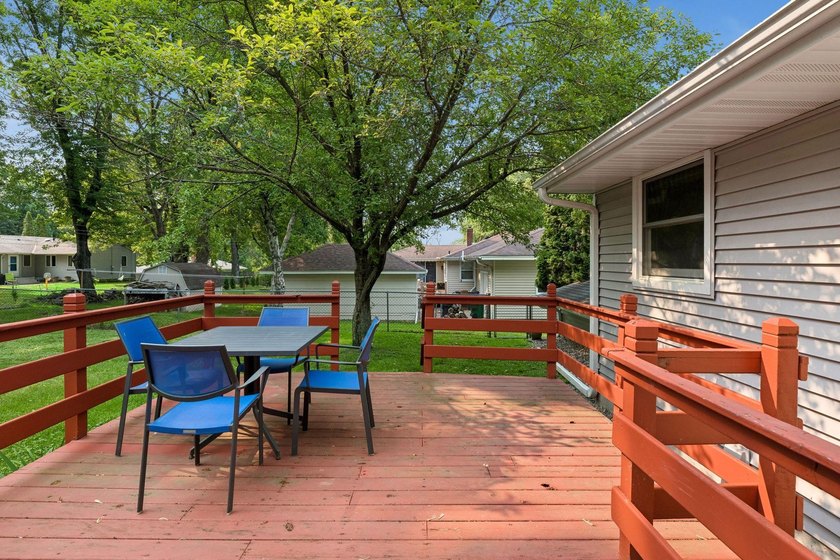 This walkout rambler is nestled on a quiet street with easy - photo 36
