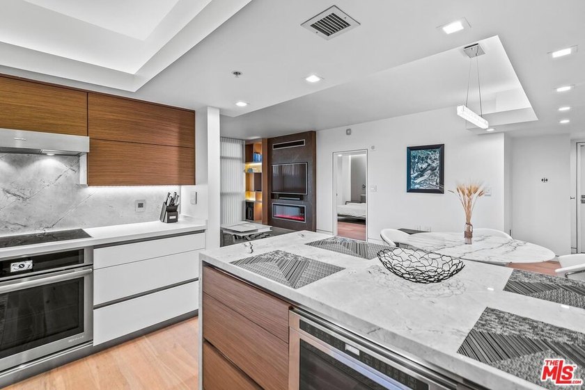 This extensively renovated corner unit is the best 1 bedroom - photo 3