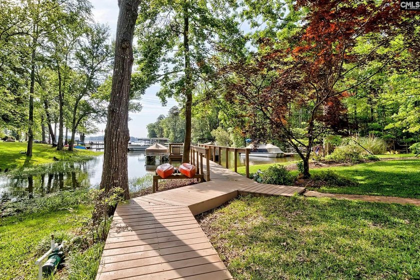 Beautifully updated home on Lake Murray! This five bedroom, 3.5 - photo 7