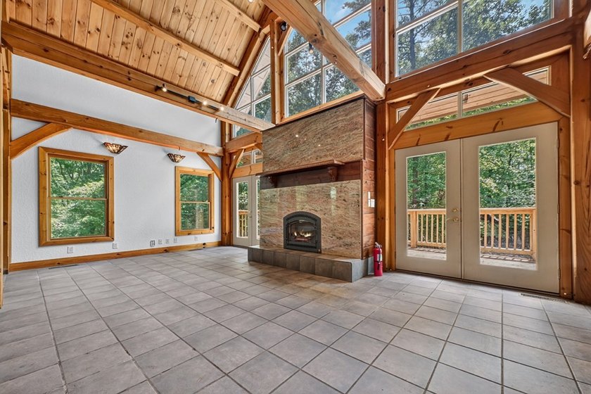 True Timber Frame Home on 49.43 private acres! Escape to your - photo 9