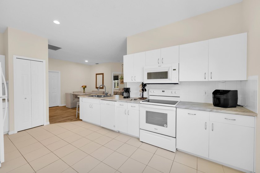 Welcome to effortless Florida living in the highly sought-after - photo 11