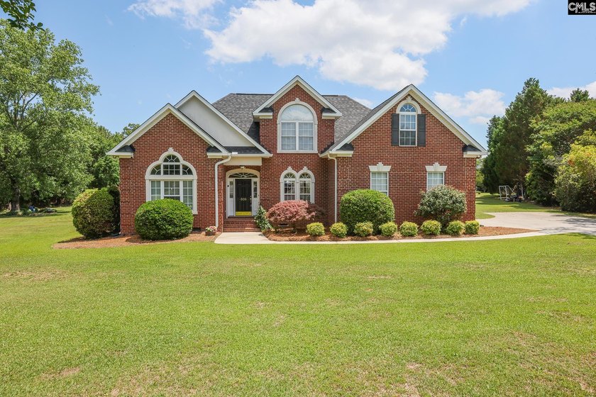 Brick home in one of the most desirable gated communities near - photo 3