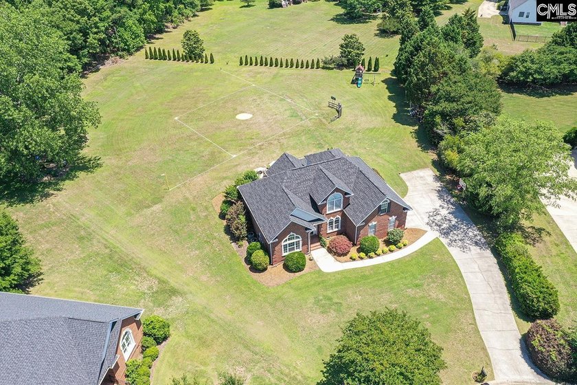 Brick home in one of the most desirable gated communities near - photo 5