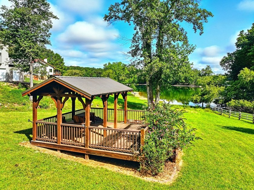 Find lakefront bliss in this charming &amp; spacious home that sits - photo 3