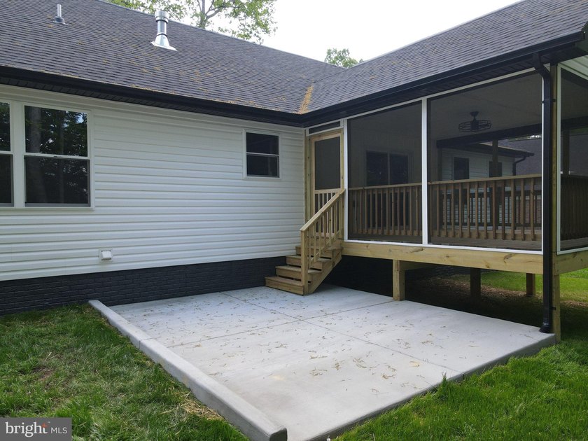 Nestled in the prestigious Lake of the Woods community, this - photo 13