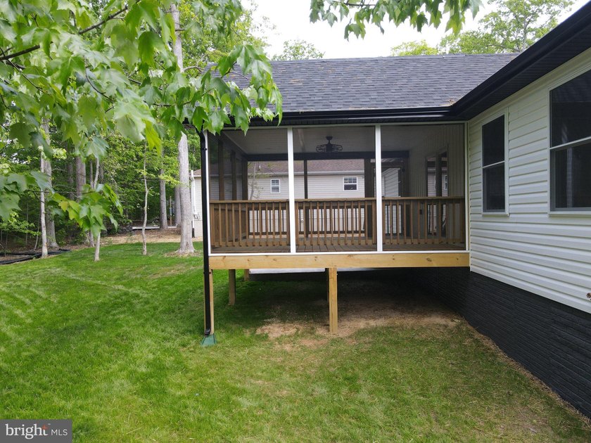 Nestled in the prestigious Lake of the Woods community, this - photo 15