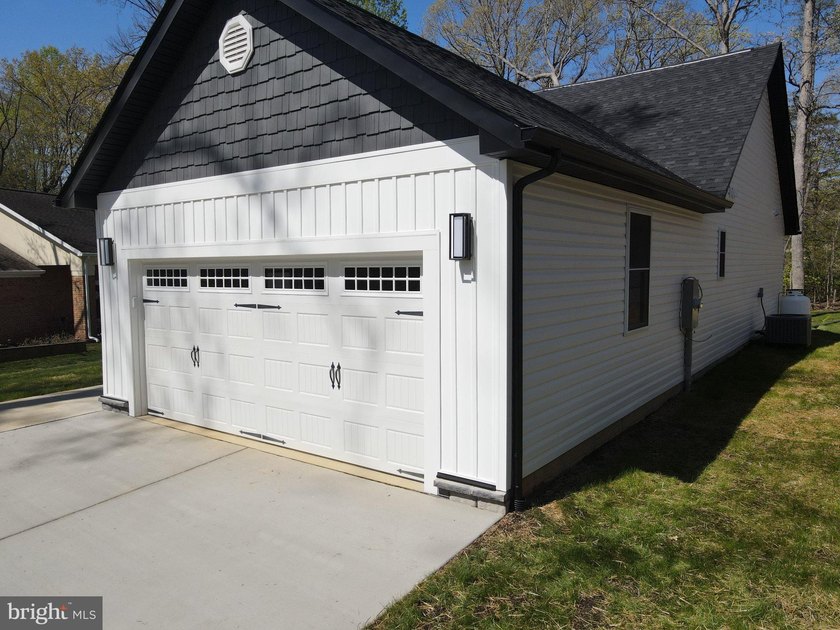 Nestled in the prestigious Lake of the Woods community, this - photo 18