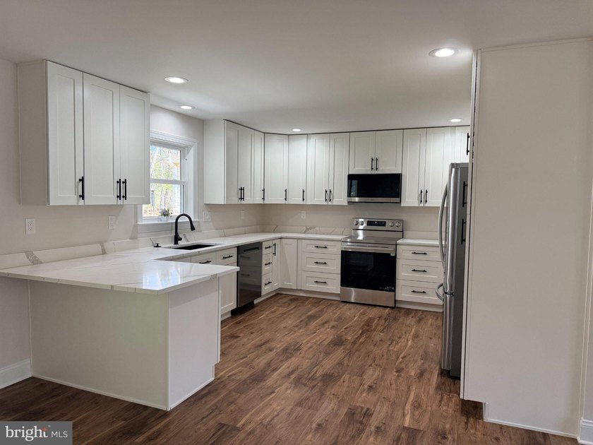 Nestled in the prestigious Lake of the Woods community, this - photo 22