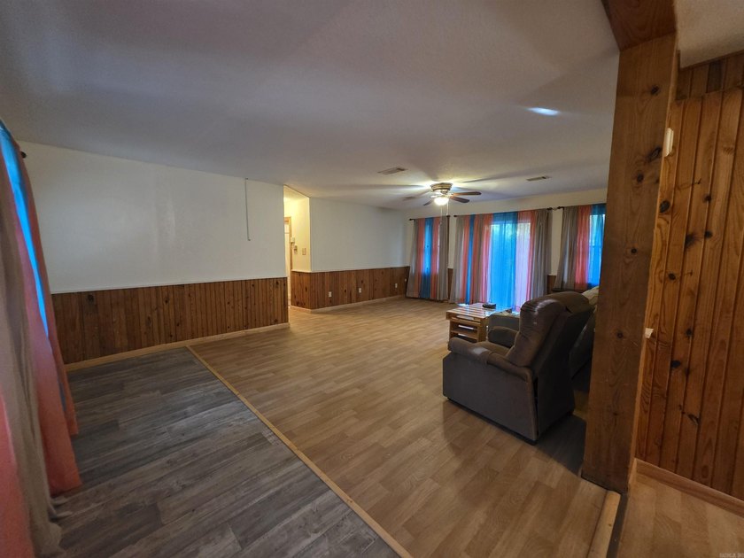 A rare find in Mena - a rustic home on 5 beautiful acres with - photo 17
