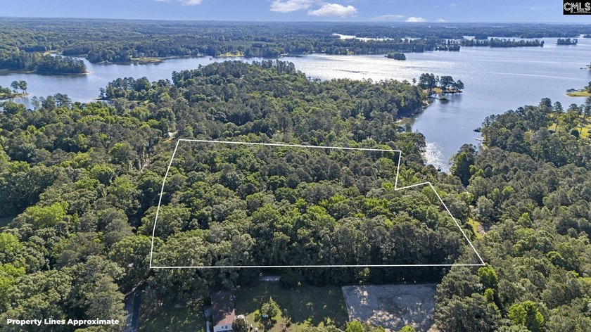 7.44 acres connected to Dominion Energy lakefront land. Recently - photo 2