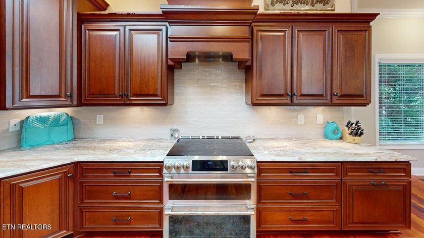 Experience exceptional lakefront living in Tellico Village with - photo 14