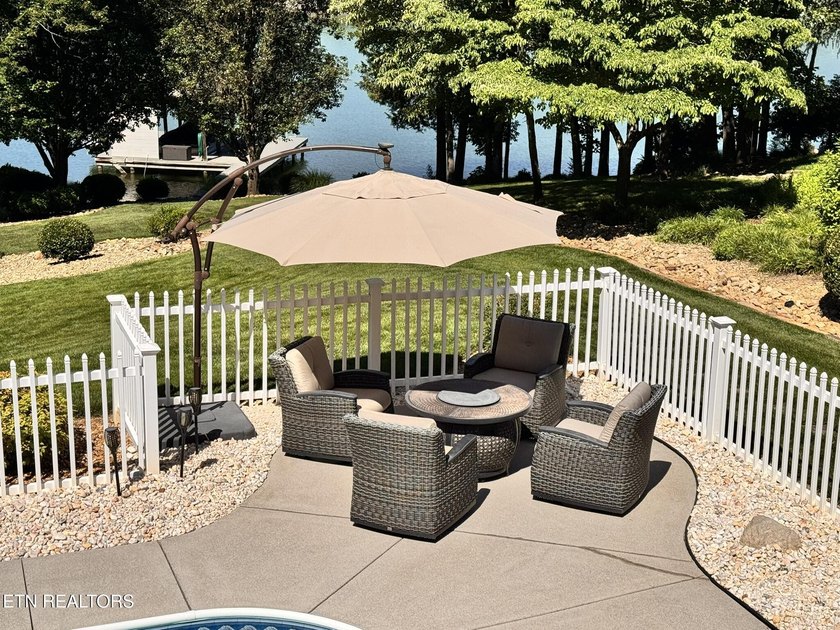 Experience exceptional lakefront living in Tellico Village with - photo 31