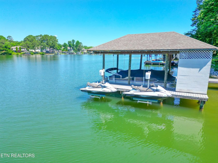 Experience exceptional lakefront living in Tellico Village with - photo 56