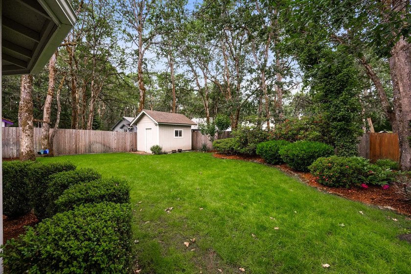 Welcome home to this beautifully maintained rambler in the - photo 22