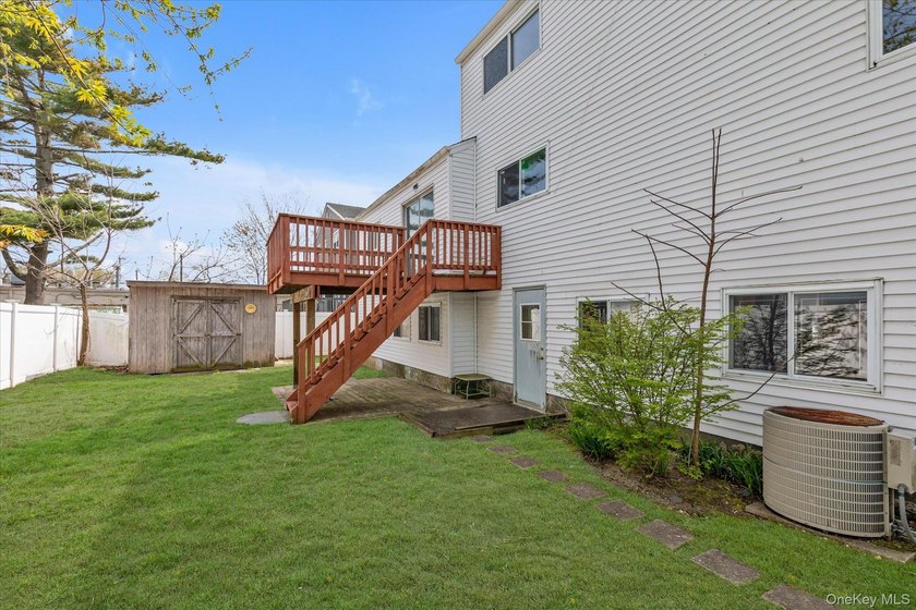 Merrick 5-bedroom 3 bath colonial over a ground floor active - photo 28