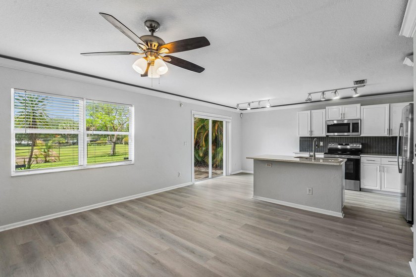 Welcome to 3260 Commodore Court, a beautifully renovated lake - photo 7