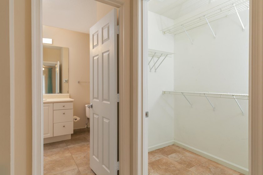 First-floor living, gated community, and the Indian River Lagoon - photo 12