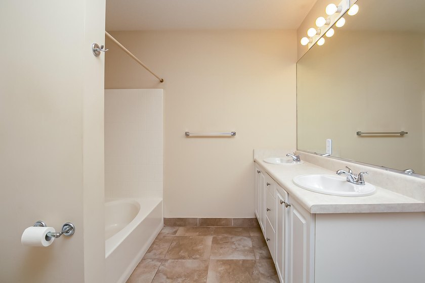 First-floor living, gated community, and the Indian River Lagoon - photo 18