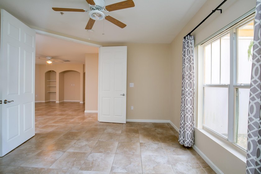 First-floor living, gated community, and the Indian River Lagoon - photo 21