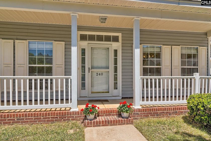 Nestled on an awesome corner lot in the established community of - photo 2