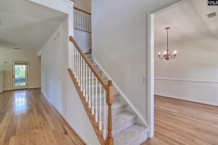 Nestled on an awesome corner lot in the established community of - photo 6