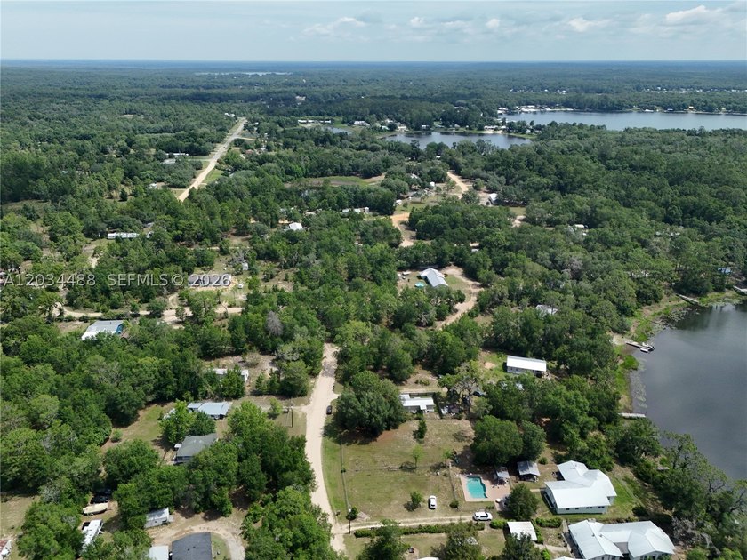 Discover the potential of this spacious vacant lot located in - photo 4