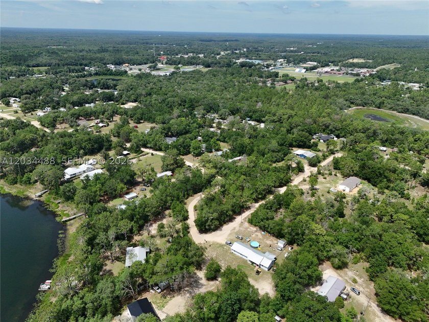 Discover the potential of this spacious vacant lot located in - photo 8