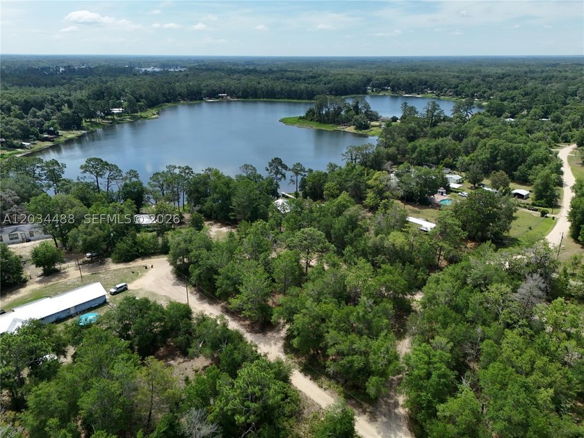 Discover the potential of this spacious vacant lot located in - photo 10