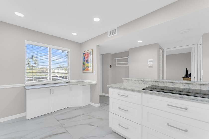 Stunning condo with pond and lake view. Enter to this beautifull - photo 14