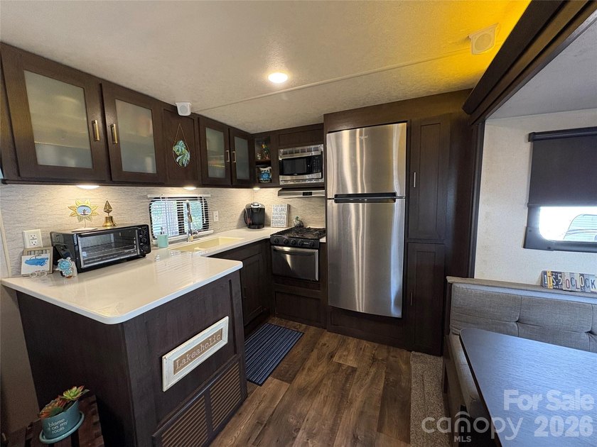 Back on the market and ready for summer at Badin Lake! Whether - photo 8