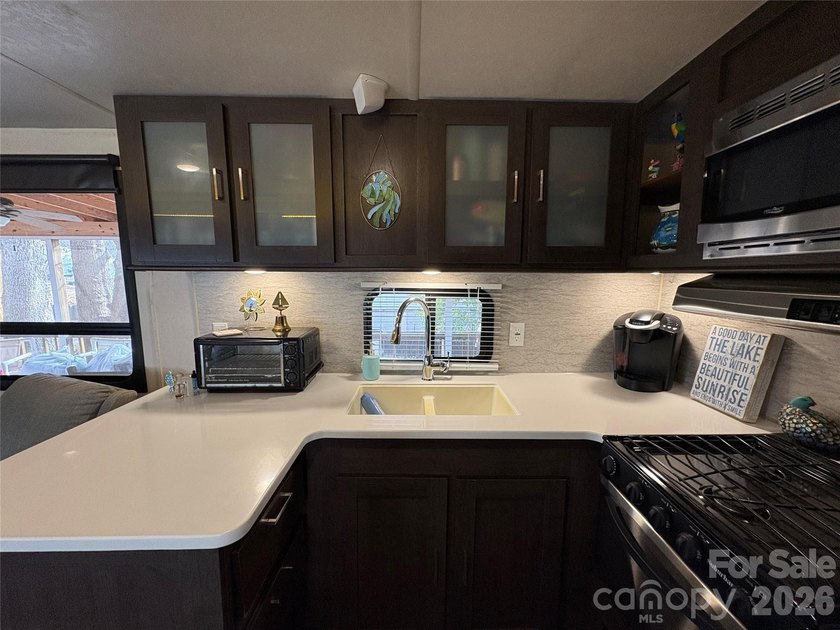 Back on the market and ready for summer at Badin Lake! Whether - photo 9