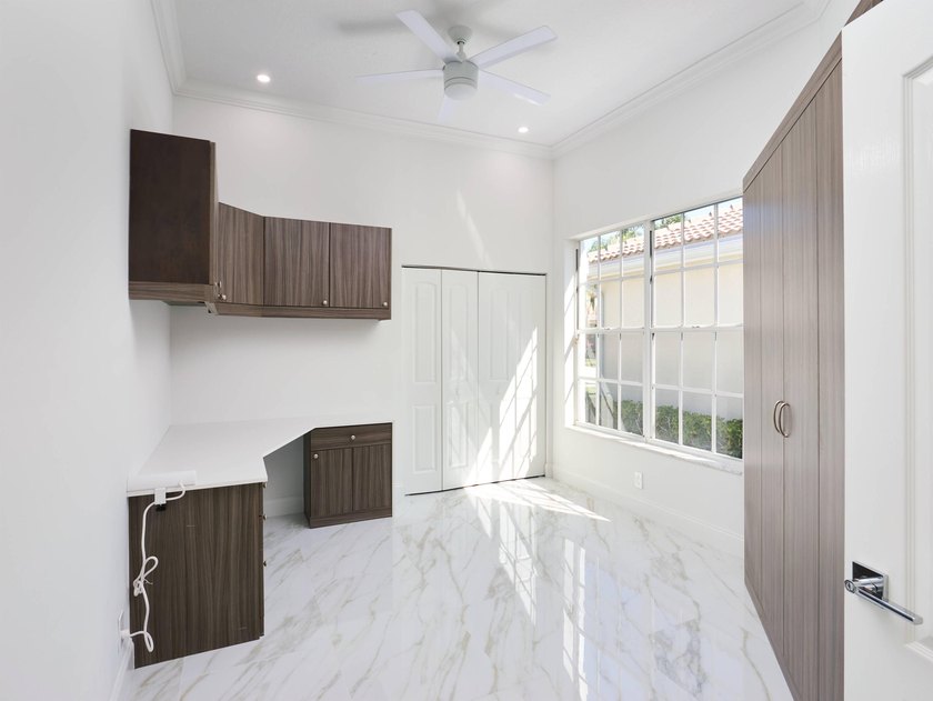 This completely reimagined 3-bedroom, 2-bath residence offers a - photo 11