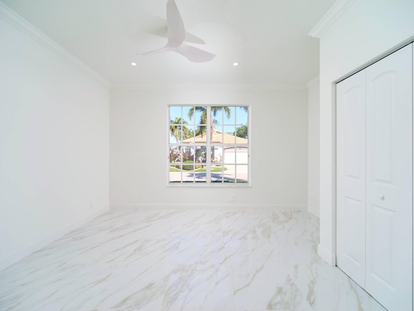This completely reimagined 3-bedroom, 2-bath residence offers a - photo 14