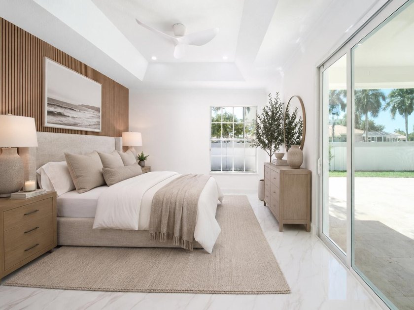This completely reimagined 3-bedroom, 2-bath residence offers a - photo 21
