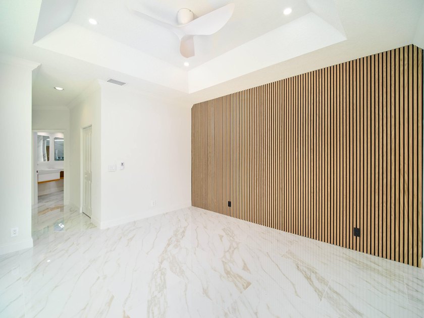 This completely reimagined 3-bedroom, 2-bath residence offers a - photo 22