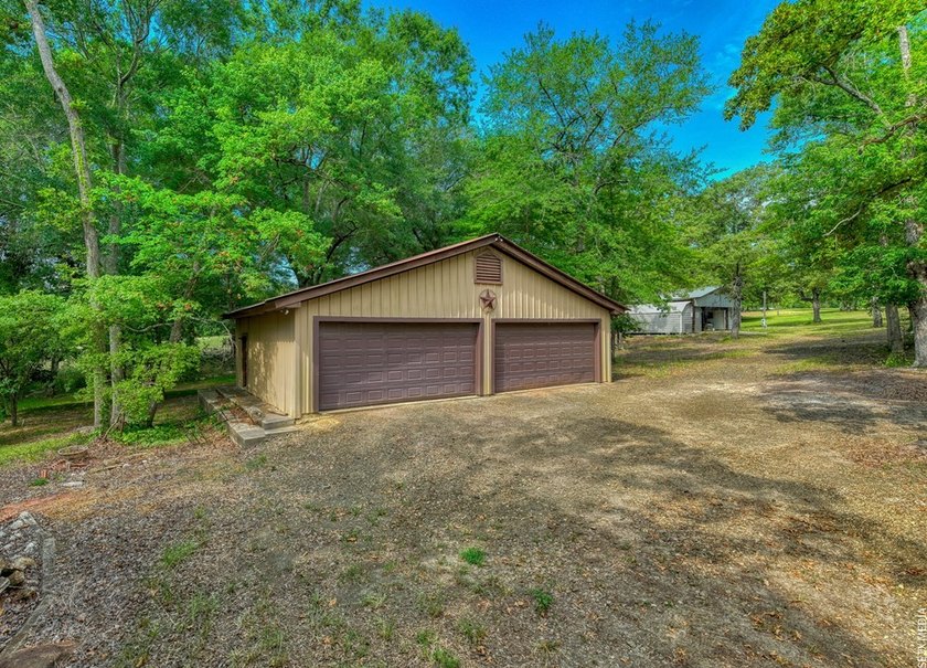 Luxury country living meets East Texas charm on this stunning 14 - photo 25