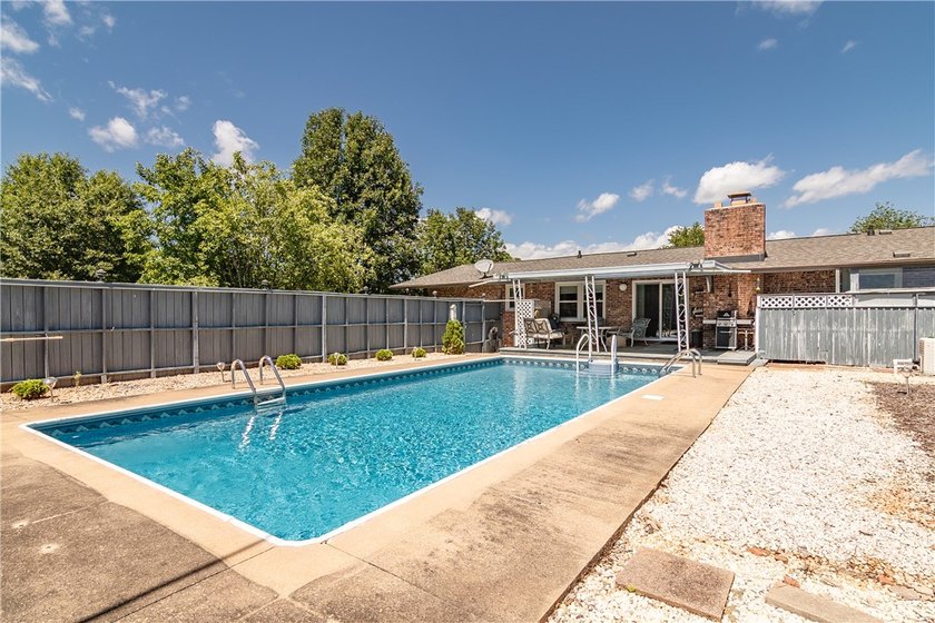 Spacious Brick Ranch with Salt-Water Pool in T.L. Hanna - photo 15