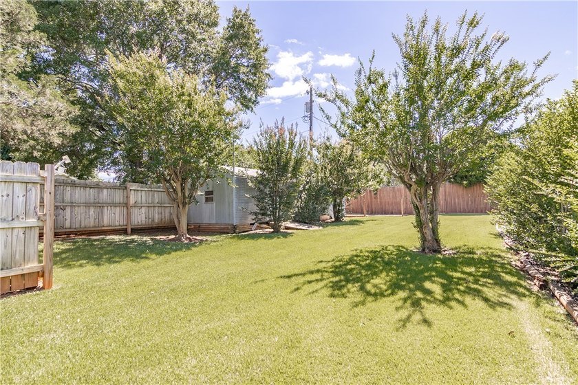 Spacious Brick Ranch with Salt-Water Pool in T.L. Hanna - photo 16