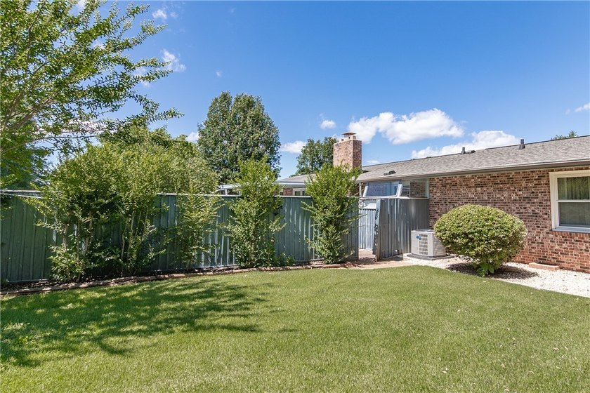 Spacious Brick Ranch with Salt-Water Pool in T.L. Hanna - photo 19