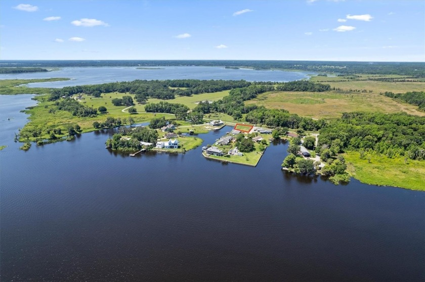 Exceptional Lakefront Opportunity in Orange Lake Shores! - photo 2