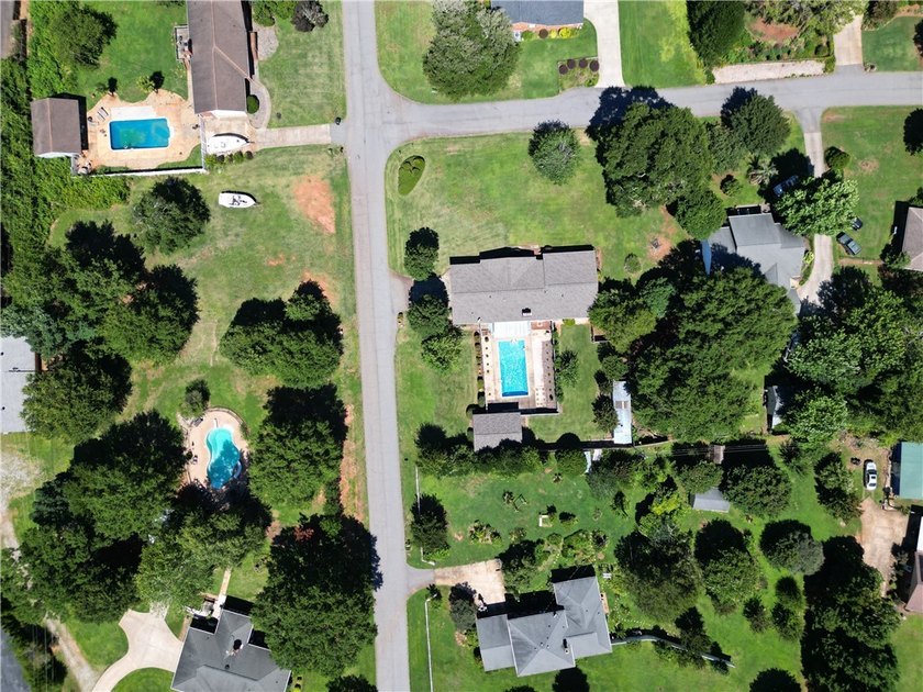 Spacious Brick Ranch with Salt-Water Pool in T.L. Hanna - photo 43