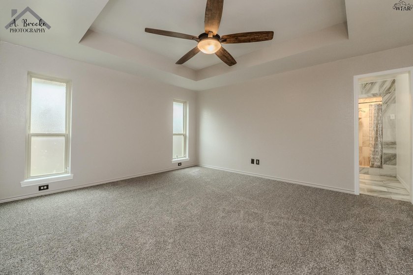 Spacious 3-bedroom, 2-bath home offering over 2,300 sq ft in a - photo 16