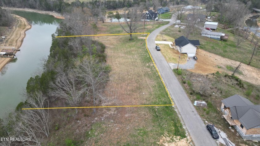 Beautiful 1.73-acre lot at the lake with 420 FEET OF - photo 5