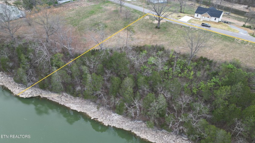 Beautiful 1.73-acre lot at the lake with 420 FEET OF - photo 6